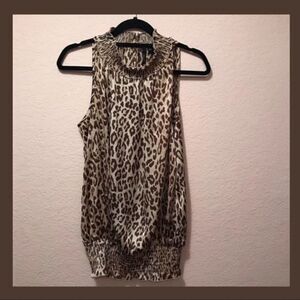 NWOT. Essentials by Milano Leopard Print Top
